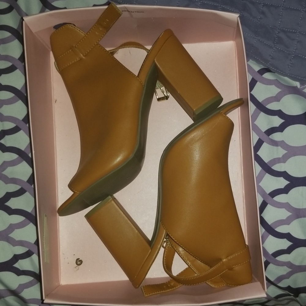Brand New CC Caramel colored Sling back shoes